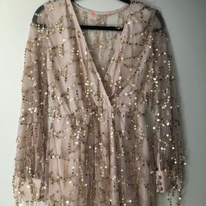Cream colored sequin romper